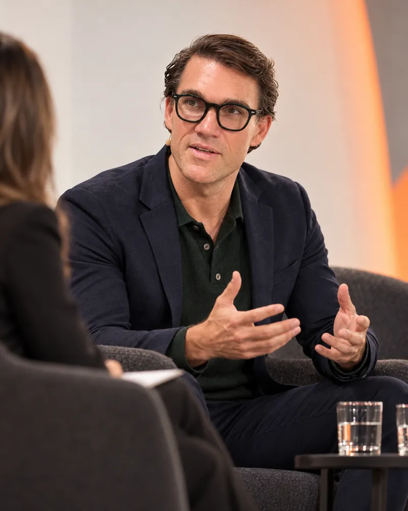 Karl Lillrud in a fireside conversation on stage about AI